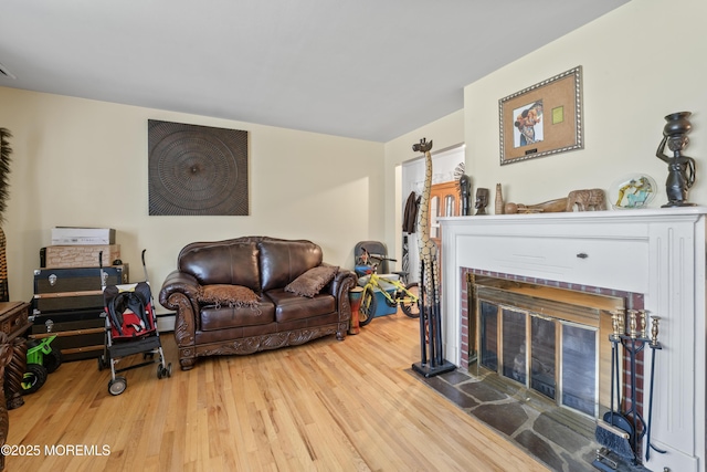 1920 W Lake Ave, Neptune Township, NJ 07753 - living room featuring wood finished floors and a fireplace