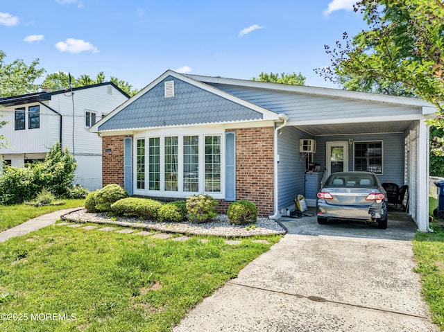 1920 W Lake Ave, Neptune Township, NJ 07753 - view of front facade with driveway, brick siding, a carport, and a front yard