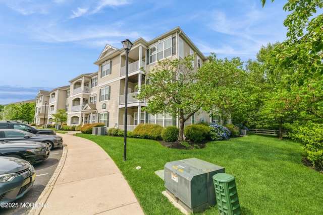 326 Sloan Ct, Matawan, NJ 07747 - view of apartment building / complex with uncovered parking
