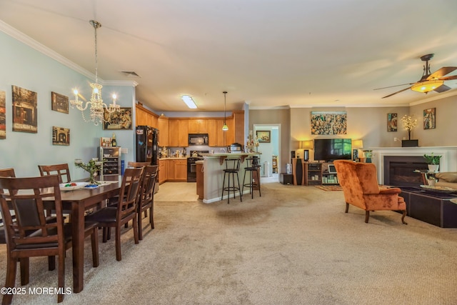 326 Sloan Ct, Matawan, NJ 07747 - dining area with crown molding, light colored carpet, a chandelier, and a ceiling fan