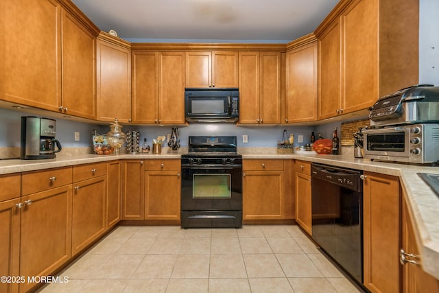 326 Sloan Ct, Matawan, NJ 07747 - kitchen with black appliances, light countertops, and brown cabinetry