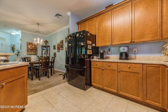 326 Sloan Ct, Matawan, NJ 07747 - kitchen with freestanding refrigerator, light colored carpet, brown cabinets, crown molding, and light countertops