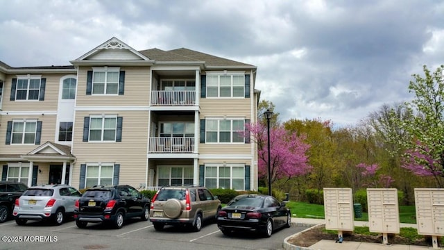 326 Sloan Ct, Matawan, NJ 07747 - view of building exterior featuring uncovered parking