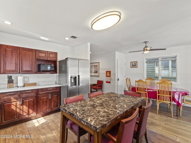 305 Franklin Ave, Seaside Heights, NJ 08751 - kitchen with stainless steel fridge with ice dispenser, black microwave, light wood-style floors, reddish brown cabinets, and recessed lighting