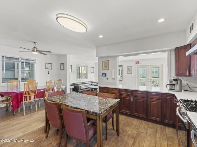 305 Franklin Ave, Seaside Heights, NJ 08751 - kitchen featuring a ceiling fan, light wood finished floors, stainless steel gas range oven, recessed lighting, and french doors