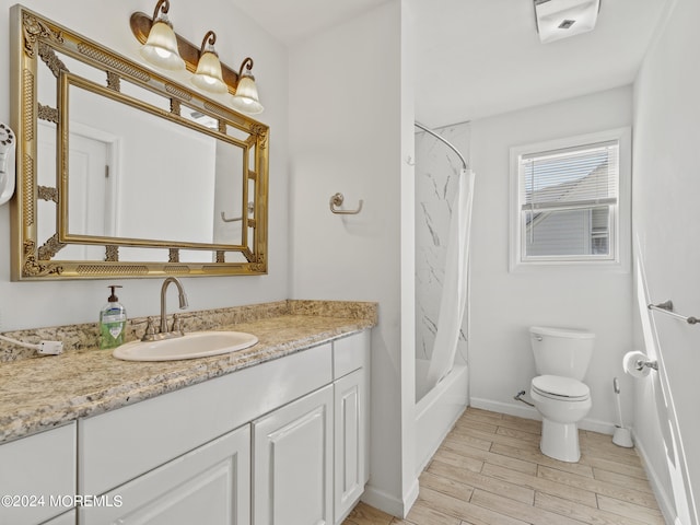 305 Franklin Ave, Seaside Heights, NJ 08751 - bathroom featuring vanity, toilet, baseboards, shower / bath combination with curtain, and wood finished floors