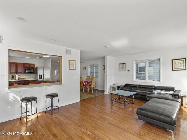 305 Franklin Ave, Seaside Heights, NJ 08751 - living room with wood finished floors, baseboards, and recessed lighting