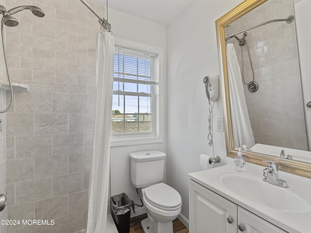 305 Franklin Ave, Seaside Heights, NJ 08751 - full bathroom featuring vanity, toilet, and tiled shower