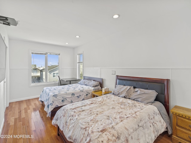 305 Franklin Ave, Seaside Heights, NJ 08751 - bedroom featuring wood finished floors, recessed lighting, and wainscoting