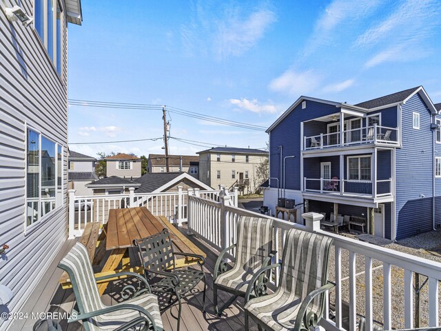 305 Franklin Ave, Seaside Heights, NJ 08751 - deck with outdoor dining area and a residential view