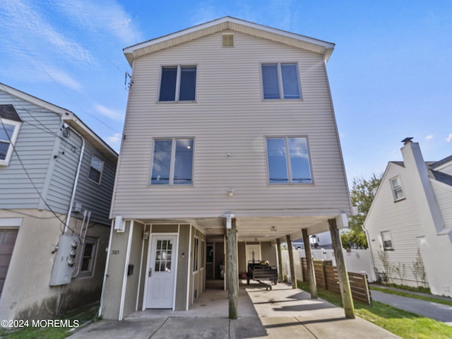 305 Franklin Ave, Seaside Heights, NJ 08751 - view of front facade with a carport and concrete driveway