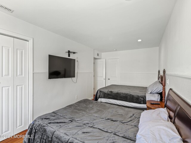 305 Franklin Ave, Seaside Heights, NJ 08751 - bedroom featuring wood finished floors, a closet, and recessed lighting