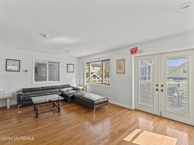 305 Franklin Ave, Seaside Heights, NJ 08751 - living area featuring wood finished floors, baseboards, and french doors