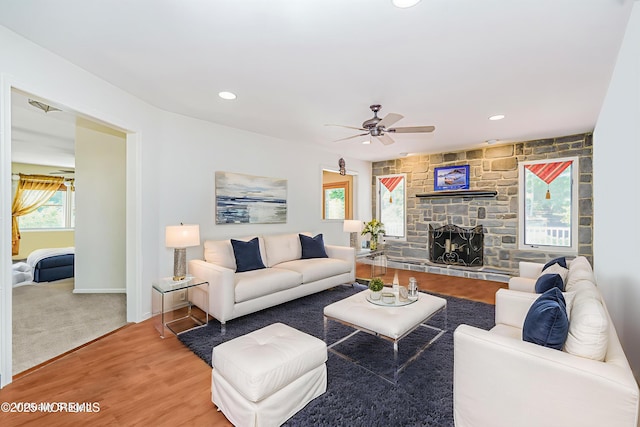 35 High Ridge Rd, Ocean Twp, NJ 07712 - living room with ceiling fan, wood finished floors, a stone fireplace, and recessed lighting