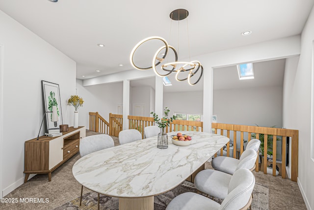35 High Ridge Rd, Ocean Twp, NJ 07712 - carpeted dining area with recessed lighting, a chandelier, a skylight, and plenty of natural light