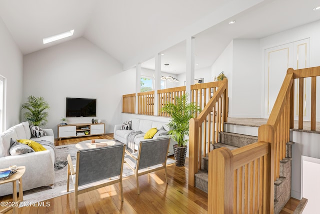35 High Ridge Rd, Ocean Twp, NJ 07712 - living area featuring a skylight, wood finished floors, lofted ceiling, recessed lighting, and stairway