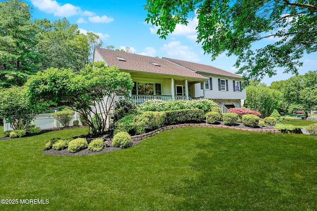 35 High Ridge Rd, Ocean Twp, NJ 07712 - view of front facade featuring a front yard and roof with shingles