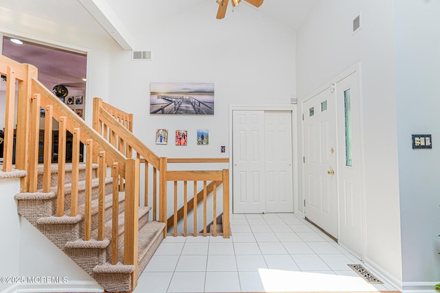 35 High Ridge Rd, Ocean Twp, NJ 07712 - foyer entrance featuring high vaulted ceiling, tile patterned floors, ceiling fan, and stairway