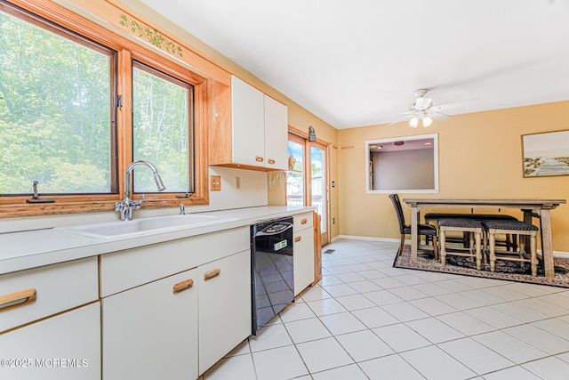 35 High Ridge Rd, Ocean Twp, NJ 07712 - kitchen featuring black dishwasher, light countertops, white cabinets, ceiling fan, and light tile patterned flooring