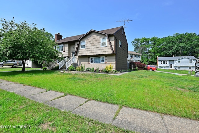 8 Michelle Ave, South Amboy, NJ 08879 - raised ranch featuring a gambrel roof, a front yard, and a chimney