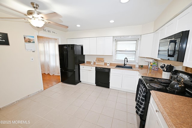 8 Michelle Ave, South Amboy, NJ 08879 - kitchen featuring black appliances, a sink, light countertops, ceiling fan, and white cabinetry