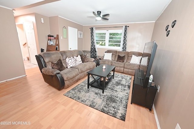 8 Michelle Ave, South Amboy, NJ 08879 - living room featuring wood finished floors, a ceiling fan, crown molding, and baseboards