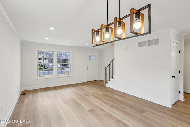 559 Holmdel Rd, Hazlet, NJ 07730 - entrance foyer featuring crown molding, light wood-style flooring, recessed lighting, stairway, and baseboards