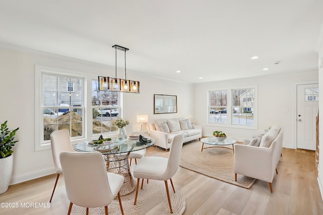 559 Holmdel Rd, Hazlet, NJ 07730 - dining space with ornamental molding, light wood-style floors, recessed lighting, and baseboards