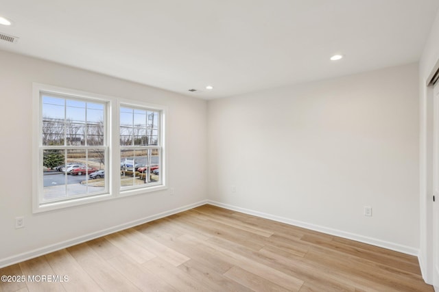 559 Holmdel Rd, Hazlet, NJ 07730 - unfurnished room featuring light wood-style floors, recessed lighting, and baseboards