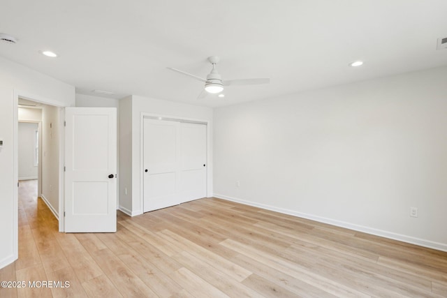 559 Holmdel Rd, Hazlet, NJ 07730 - unfurnished bedroom with light wood-style flooring, a closet, recessed lighting, and baseboards