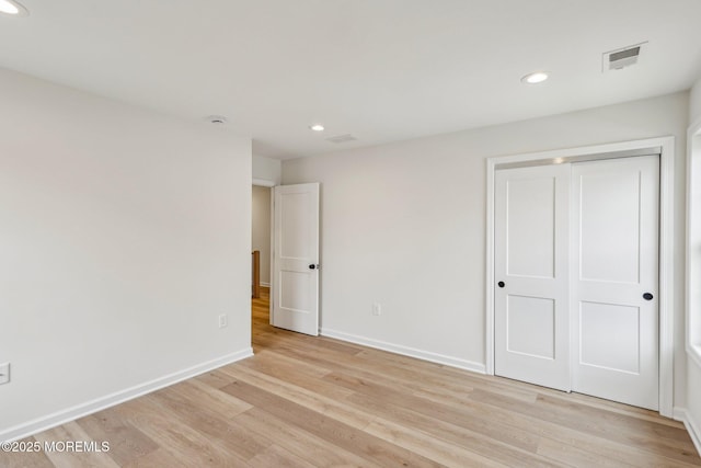 559 Holmdel Rd, Hazlet, NJ 07730 - unfurnished bedroom with recessed lighting, light wood-type flooring, baseboards, and a closet