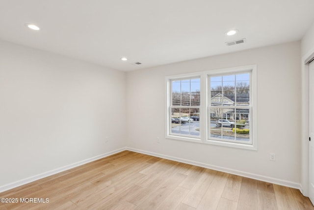 559 Holmdel Rd, Hazlet, NJ 07730 - empty room featuring baseboards, light wood finished floors, and recessed lighting