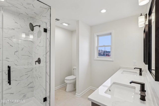 559 Holmdel Rd, Hazlet, NJ 07730 - bathroom featuring a marble finish shower, double vanity, toilet, baseboards, and recessed lighting