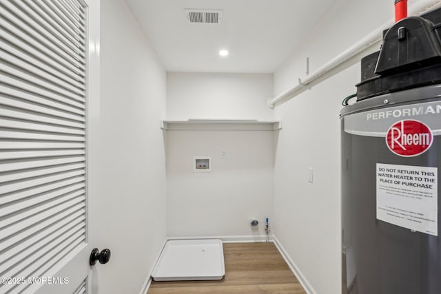 559 Holmdel Rd, Hazlet, NJ 07730 - laundry room with hookup for a washing machine, wood finished floors, gas dryer hookup, recessed lighting, and baseboards