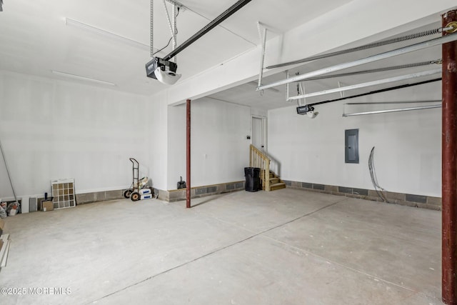559 Holmdel Rd, Hazlet, NJ 07730 - garage with electric panel and a garage door opener