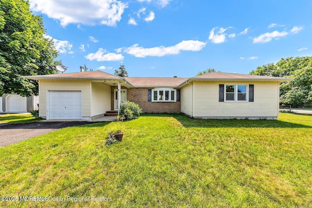 1 Bough Ct, Toms River, NJ 08753 - single story home with a garage, driveway, and a front lawn