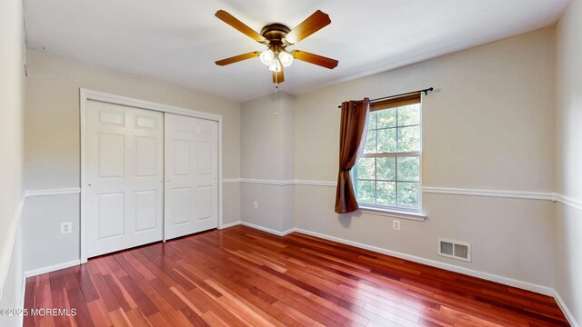 1 Crescent Rd, Old Bridge, NJ 08857 - unfurnished bedroom featuring hardwood / wood-style flooring, baseboards, a closet, and ceiling fan