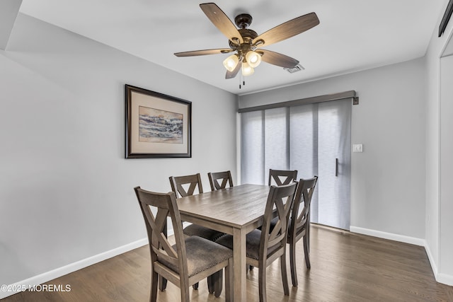 711 Chelsea St, Forked River, NJ 08731 - dining room with ceiling fan, baseboards, and wood finished floors
