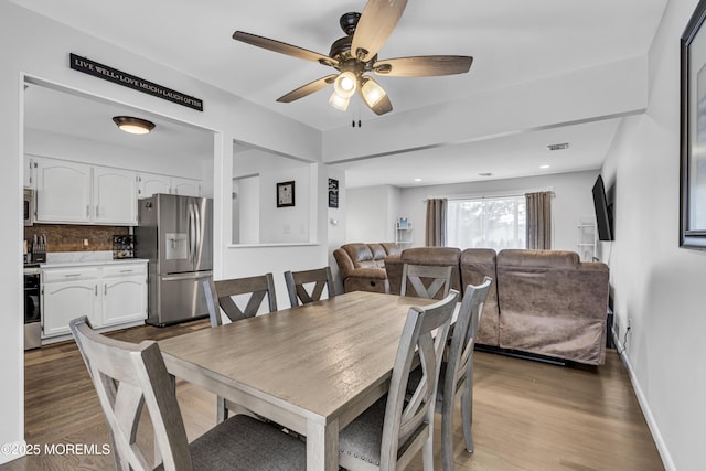 711 Chelsea St, Forked River, NJ 08731 - dining space with ceiling fan, wood finished floors, and baseboards