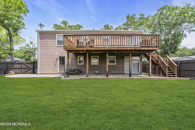 711 Chelsea St, Forked River, NJ 08731 - rear view of house featuring a deck, stairway, and a patio area