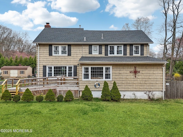 1592 W Front St, Lincroft, NJ 07738 - rear view of property featuring a chimney, a shingled roof, and a deck
