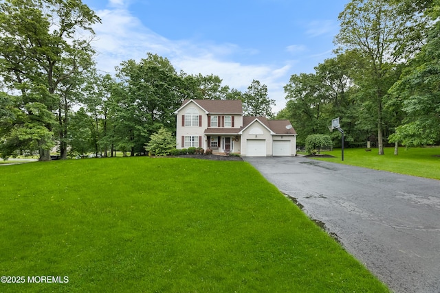 17 Durell Dr, Jackson, NJ 08527 - view of front of home featuring asphalt driveway, a front lawn, and an attached garage
