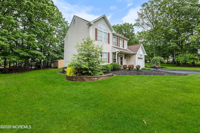 17 Durell Dr, Jackson, NJ 08527 - view of front of property with a garage, asphalt driveway, and a front lawn