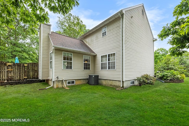 17 Durell Dr, Jackson, NJ 08527 - rear view of house with a chimney and central air condition unit