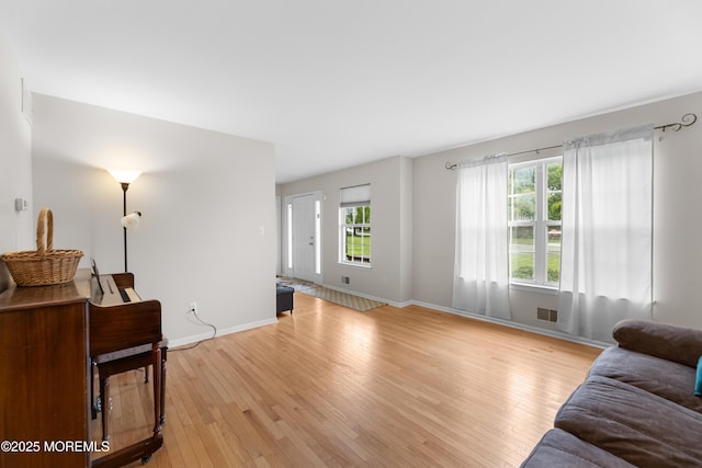 17 Durell Dr, Jackson, NJ 08527 - living area with light wood finished floors, healthy amount of natural light, and baseboards