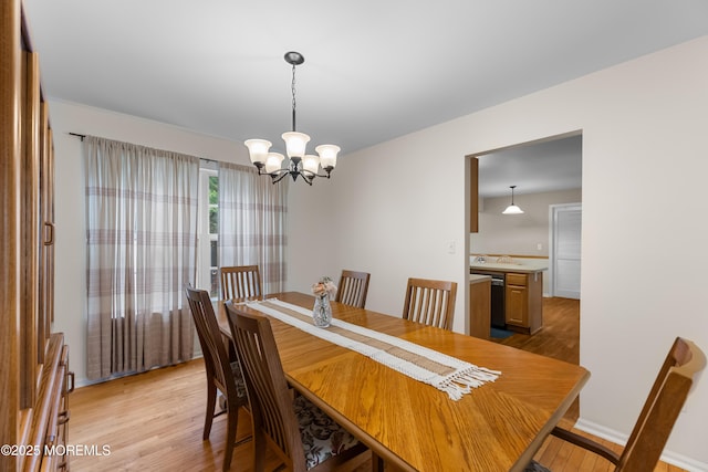17 Durell Dr, Jackson, NJ 08527 - dining space featuring a chandelier and light wood finished floors