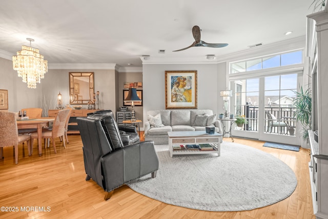 300 Cookman Ave Unit 321, Asbury Park, NJ 07712 - living room with ornamental molding, a chandelier, ceiling fan, and light wood-style floors