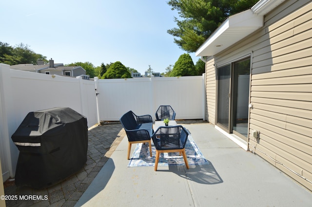 11 Fern Ct, Tinton Falls, NJ 07724 - fenced backyard featuring a patio and a gate