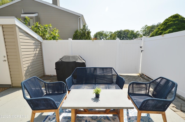 11 Fern Ct, Tinton Falls, NJ 07724 - fenced backyard with a patio area