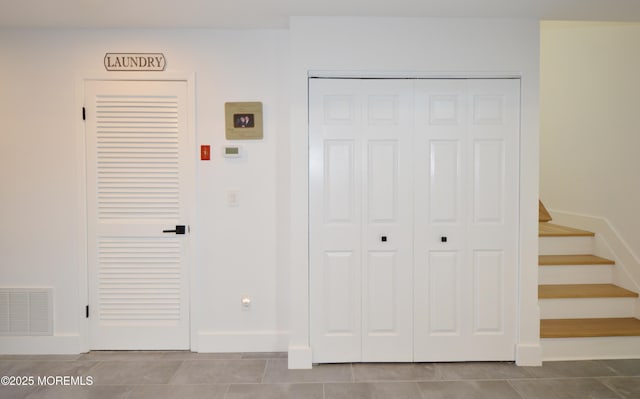 11 Fern Ct, Tinton Falls, NJ 07724 - interior space with baseboards, stairway, and tile patterned flooring